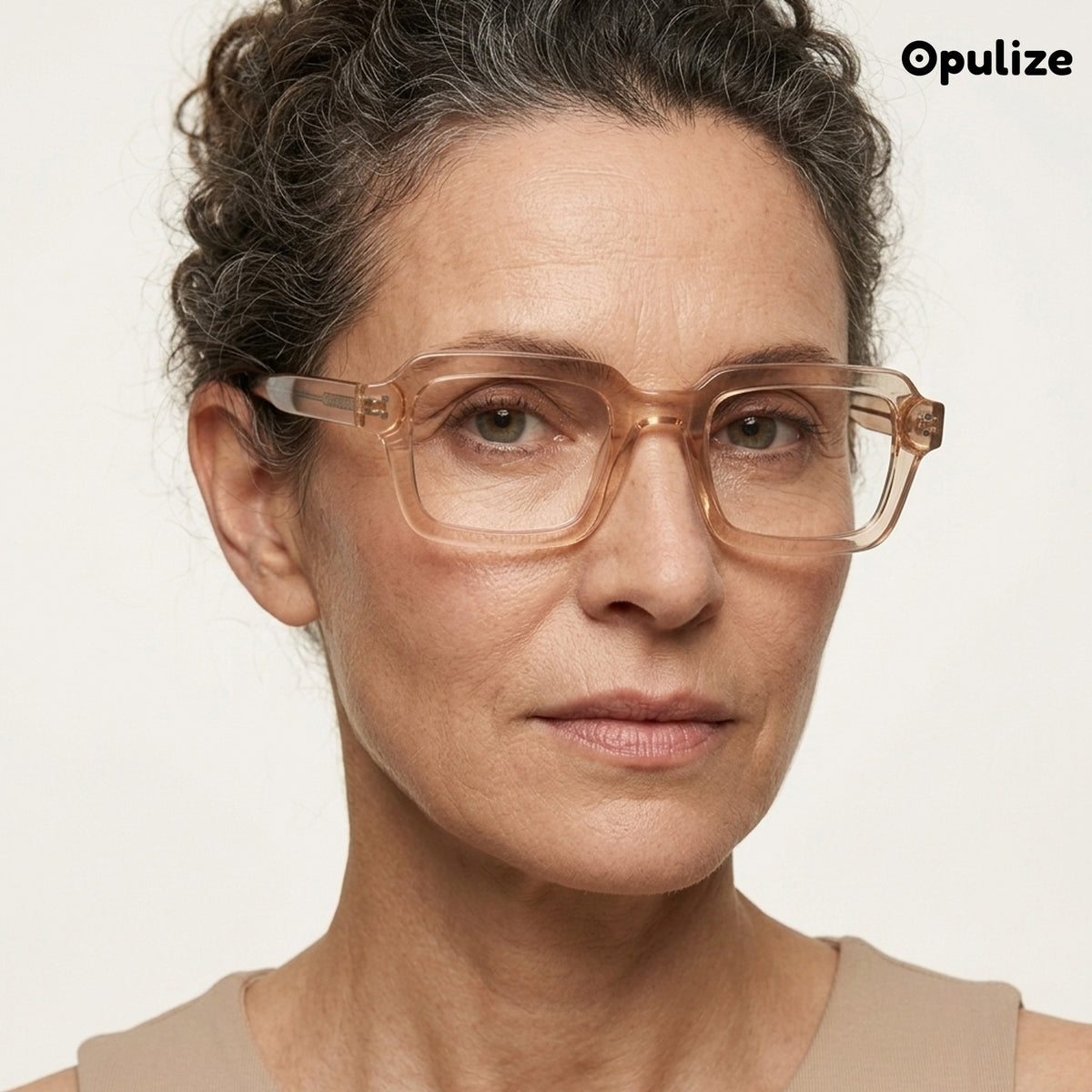 EDG zero strength blue light glasses in pink, worn by a model